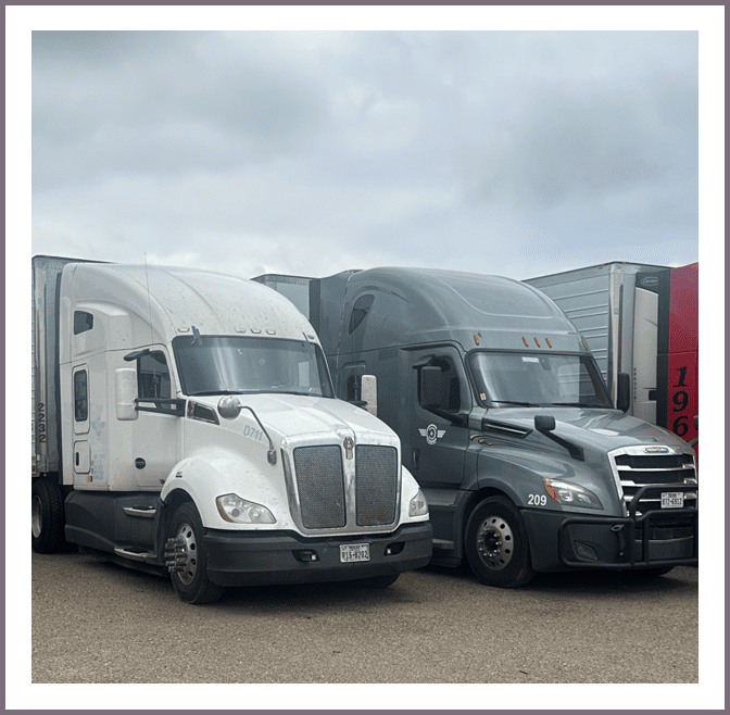 Two semi-trucks, one white and one dark grey, are parked side by side in a lot under a cloudy sky, symbolizing efficient logistics solutions.